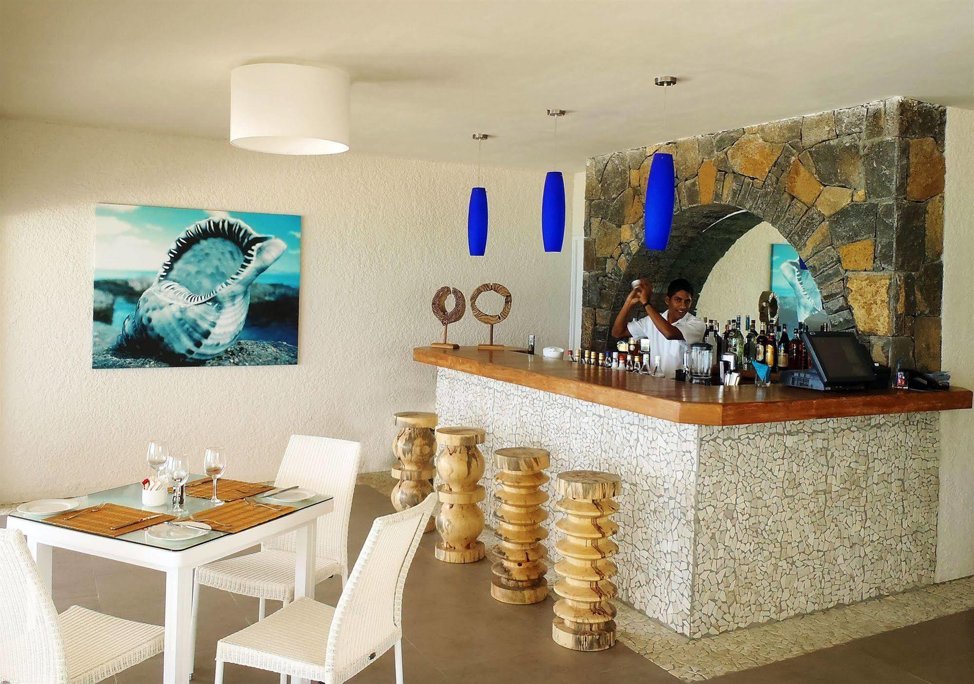 Astroea Beach Hotel (Adults Only) Blue Bay Bagian luar foto